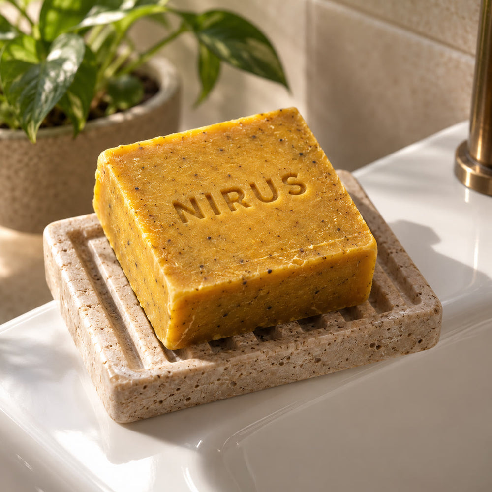 NIRUS bar on a stone soap dish